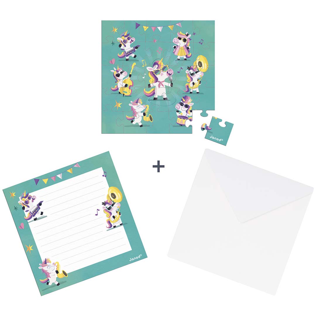 Janod puzzelkaart set met een eenhoorn puzzel, een notitiekaart en een witte envelop.