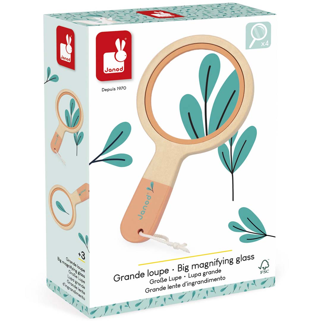 De Janod verpakking van het houten vergrootglas met een bladerenpatroon.