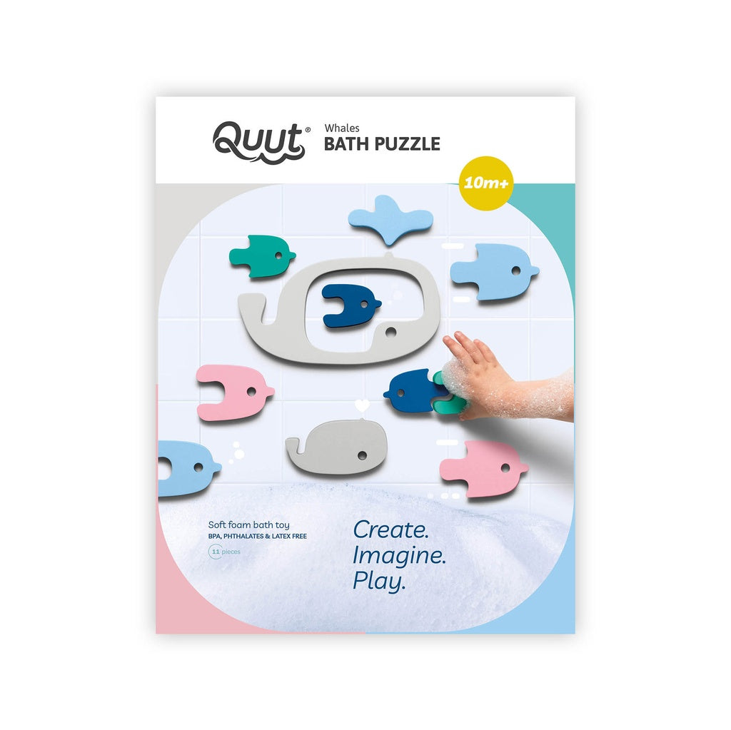 De verpakking van de Quut Whales badpuzzel, met een afbeelding van de puzzelstukken en een kinderhand.