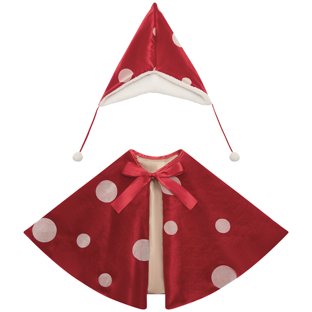mimi & lula verkleedset paddenstoel met rode cape met witte stippen en bijpassende puntmuts.