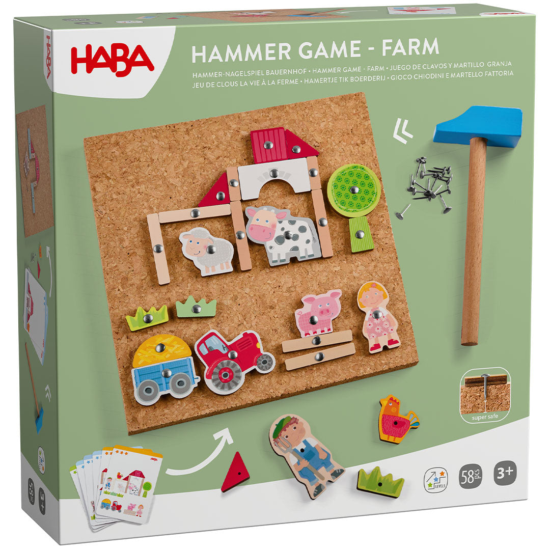 De verpakking van het HABA hamertje tik boerderij spel met een afbeelding van het spelbord en de onderdelen.