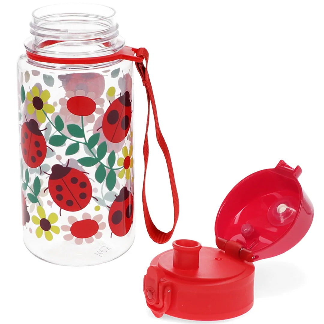 Rex London kinder drinkfles met lieveheersbeestjes en bloemen, met de rode dop open ernaast.