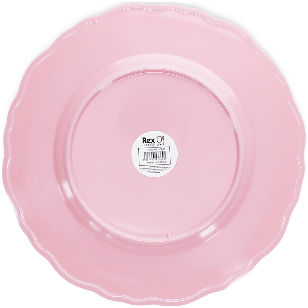 De achterkant van het Rex London roze melamine kinderbord met productinformatie sticker.