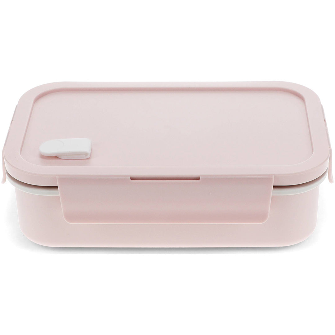 Rex London roze broodtrommel met witte sluiting, gesloten en schuin gefotografeerd.