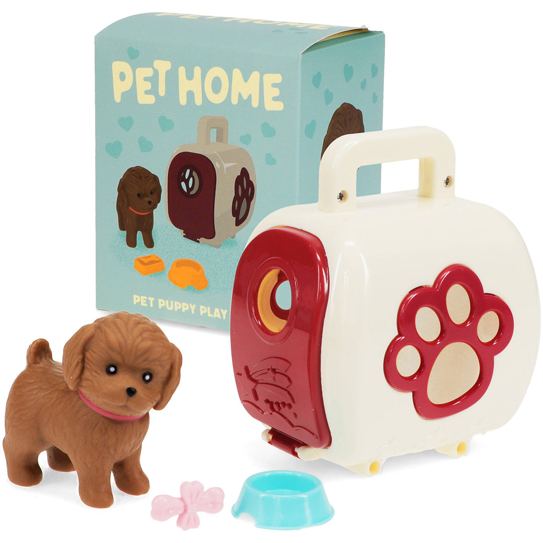 Rex London speelset met bruine puppy, beige reismand met rode accenten, voerbakje, botje en de verpakking.