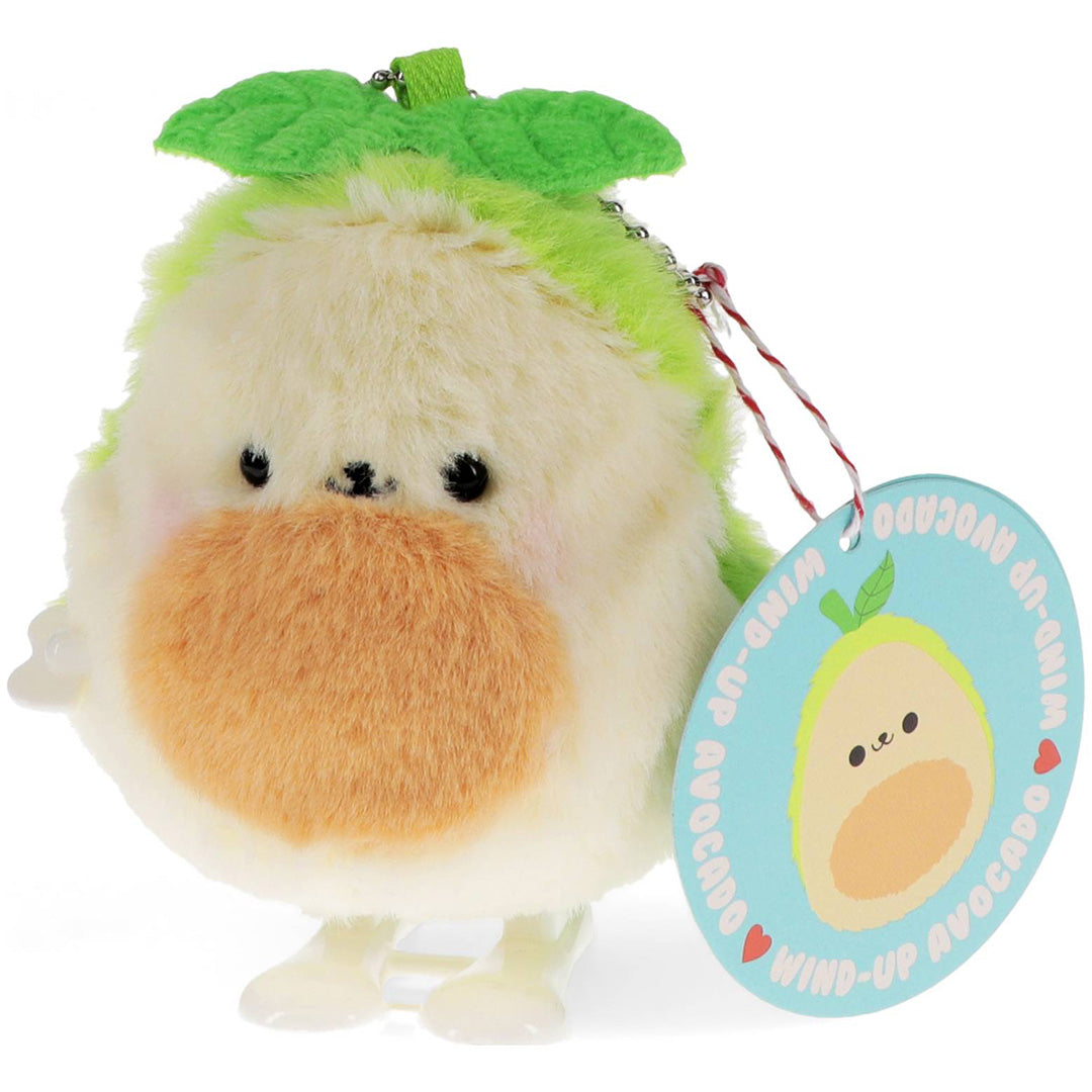 Rex London pluche avocado opwindspeeltje met productlabel aan de sleutelhanger.