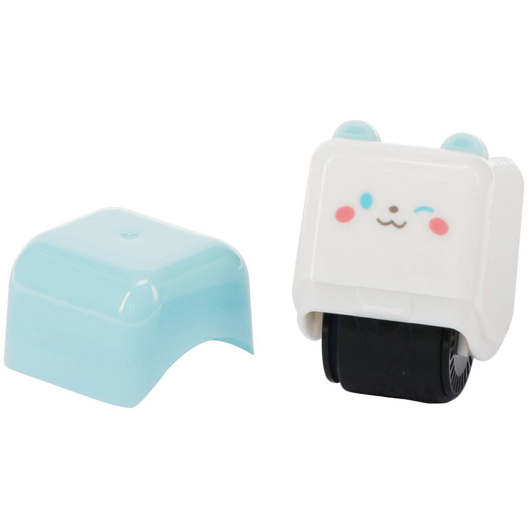 rex london puppy stempelroller met een wit puppygezicht en een losse lichtblauwe dop.