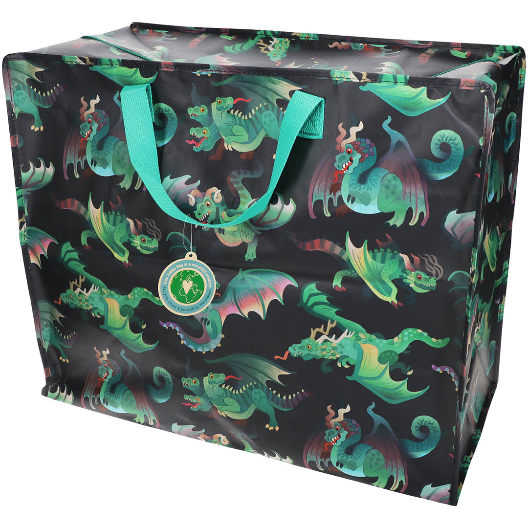 Rex London jumbo opbergtas met drakenpatroon en turquoise handvatten.