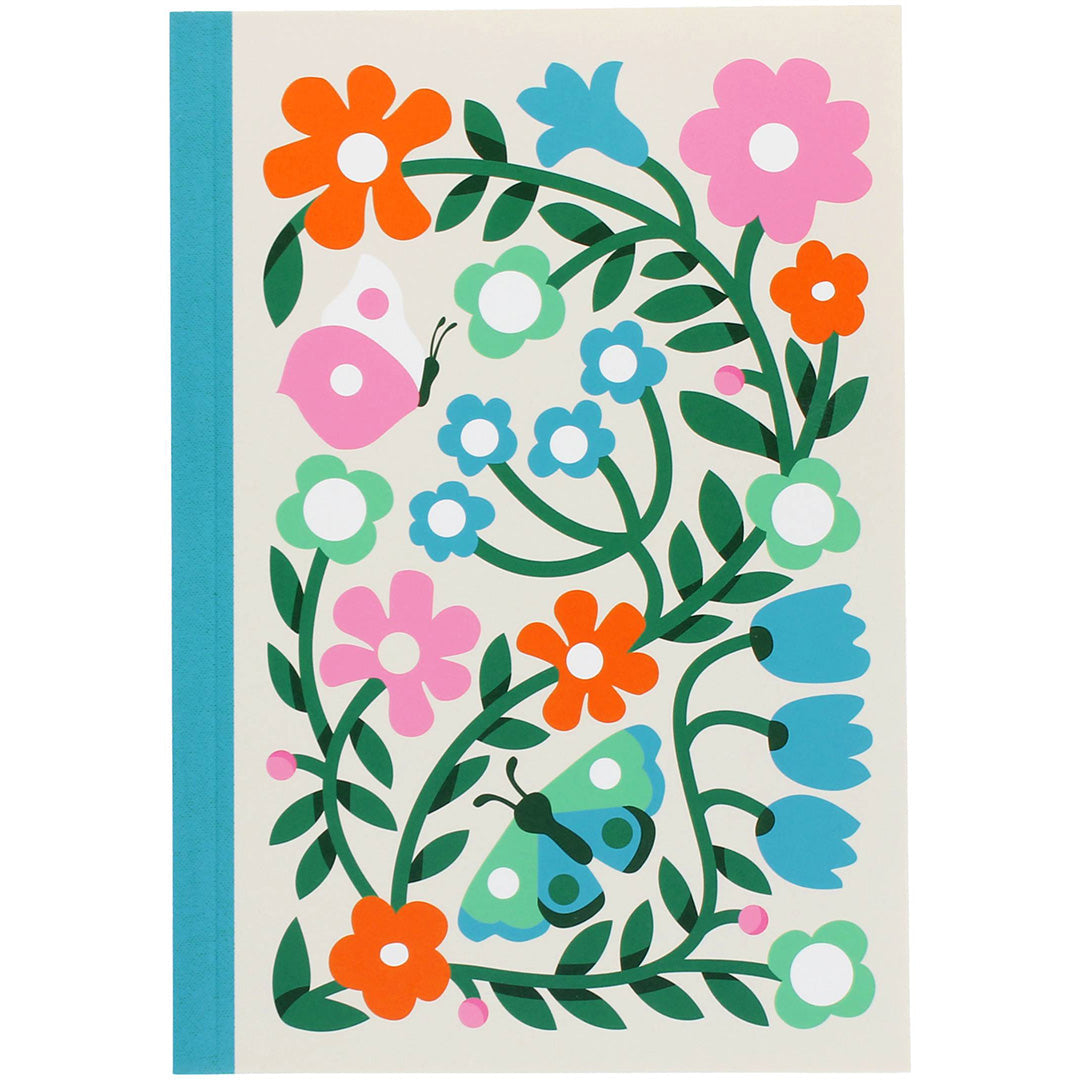 Rex London A5 schrift met een kleurrijk patroon van bloemen en vlinders.