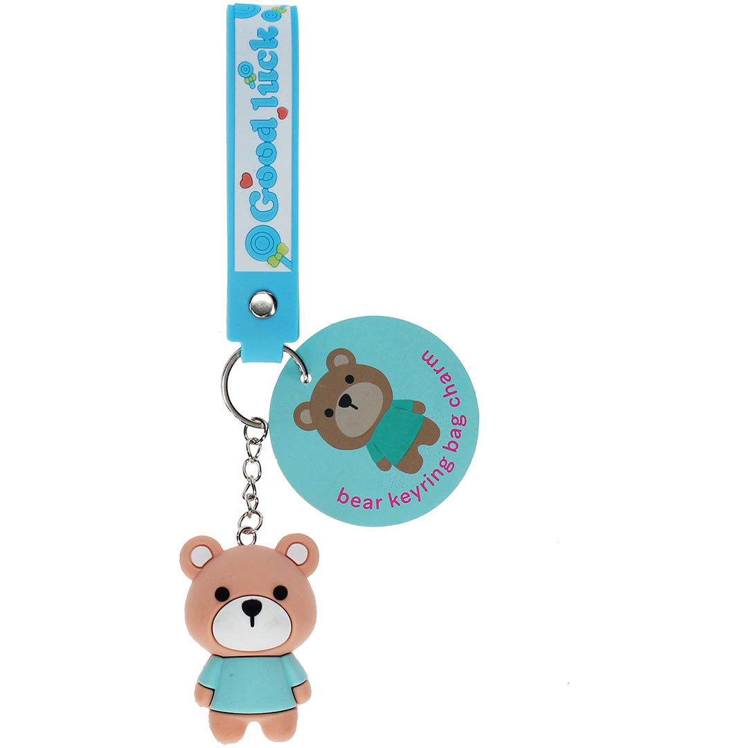 Rex London sleutelhanger met een lichtbruine teddybeer in een blauw shirt en een ronde tag met een afbeelding van de beer.