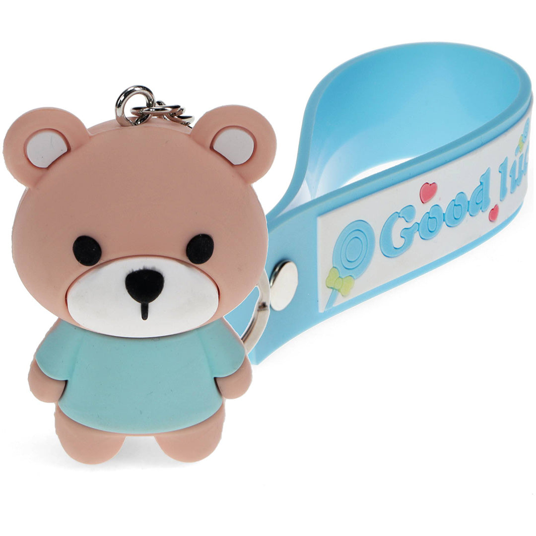 Rex London sleutelhanger met een lichtbruine teddybeer in een blauw shirt en een blauwe band met 'Good Luck'.