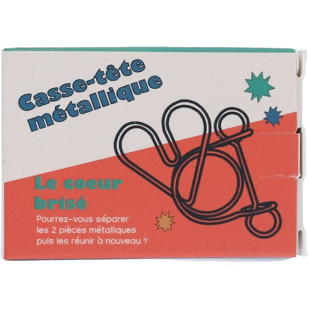 Voorkant van de verpakking van de le petit souk metalen breinbreker 'gebroken hart' met de puzzel afgebeeld.