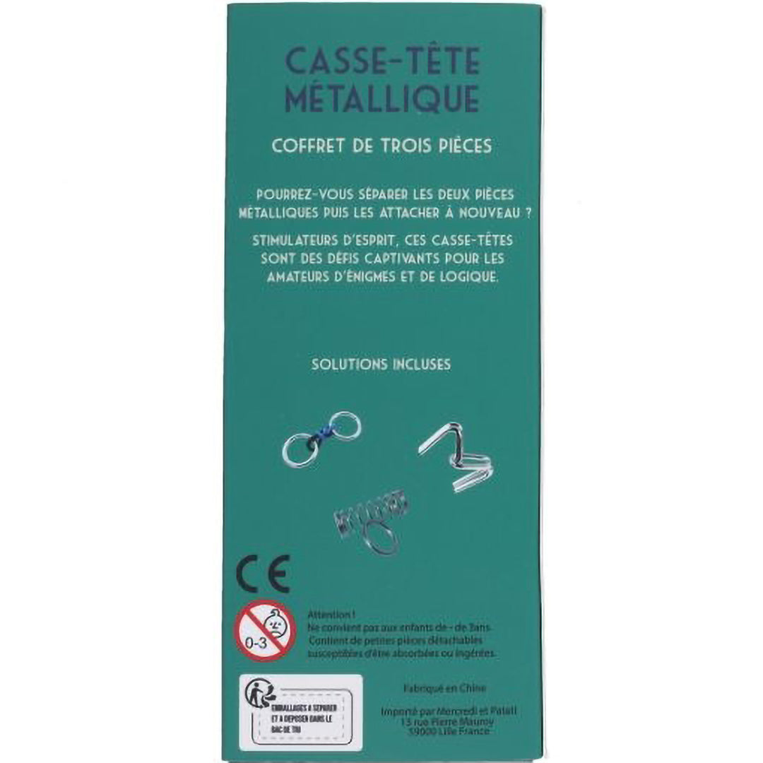De achterkant van de groene verpakking van de le petit souk metalen breinbreker trio, met uitleg en kleine afbeeldingen van de puzzels.