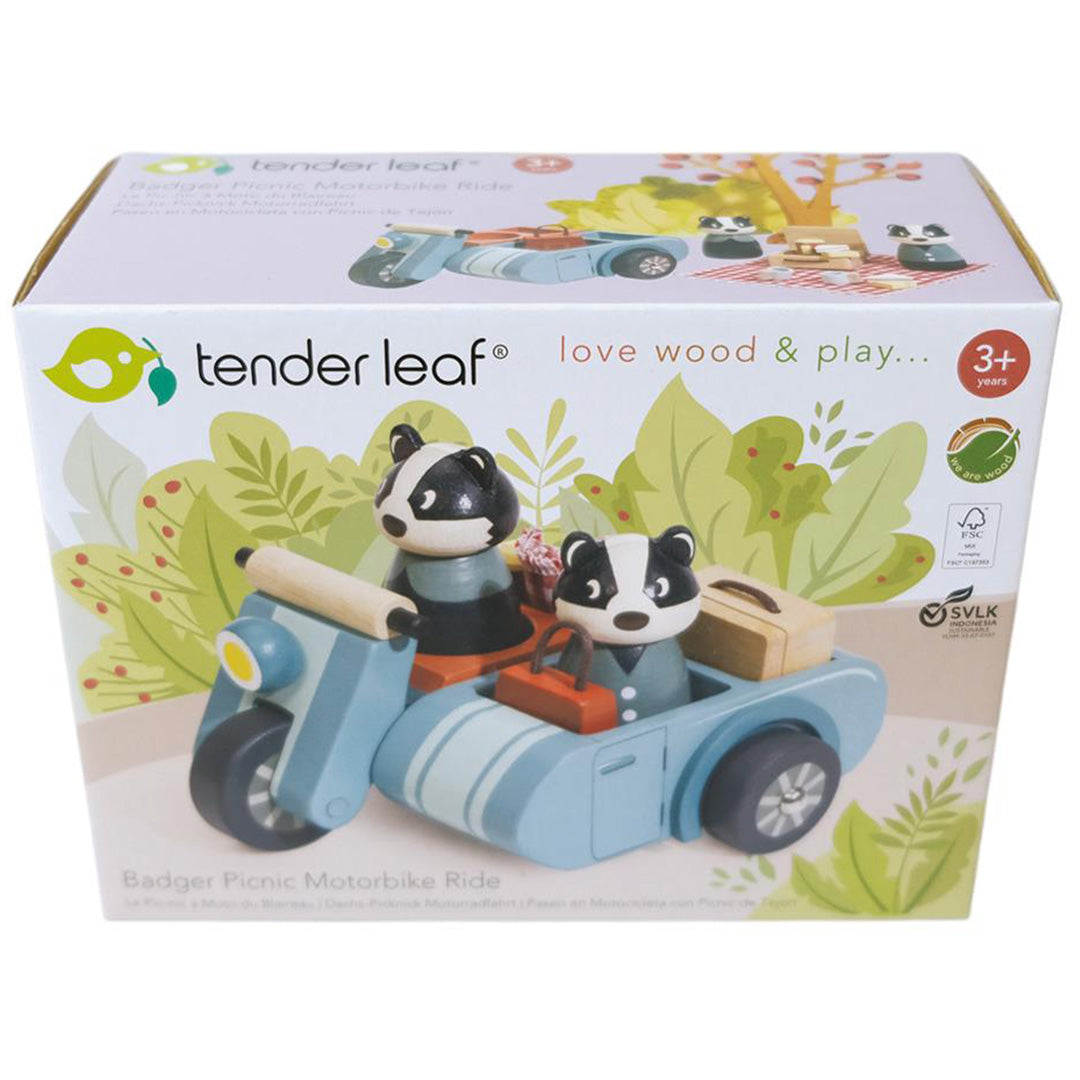 De verpakking van de Tender Leaf Toys houten speelset 'Badger Picnic Motorbike Ride'.