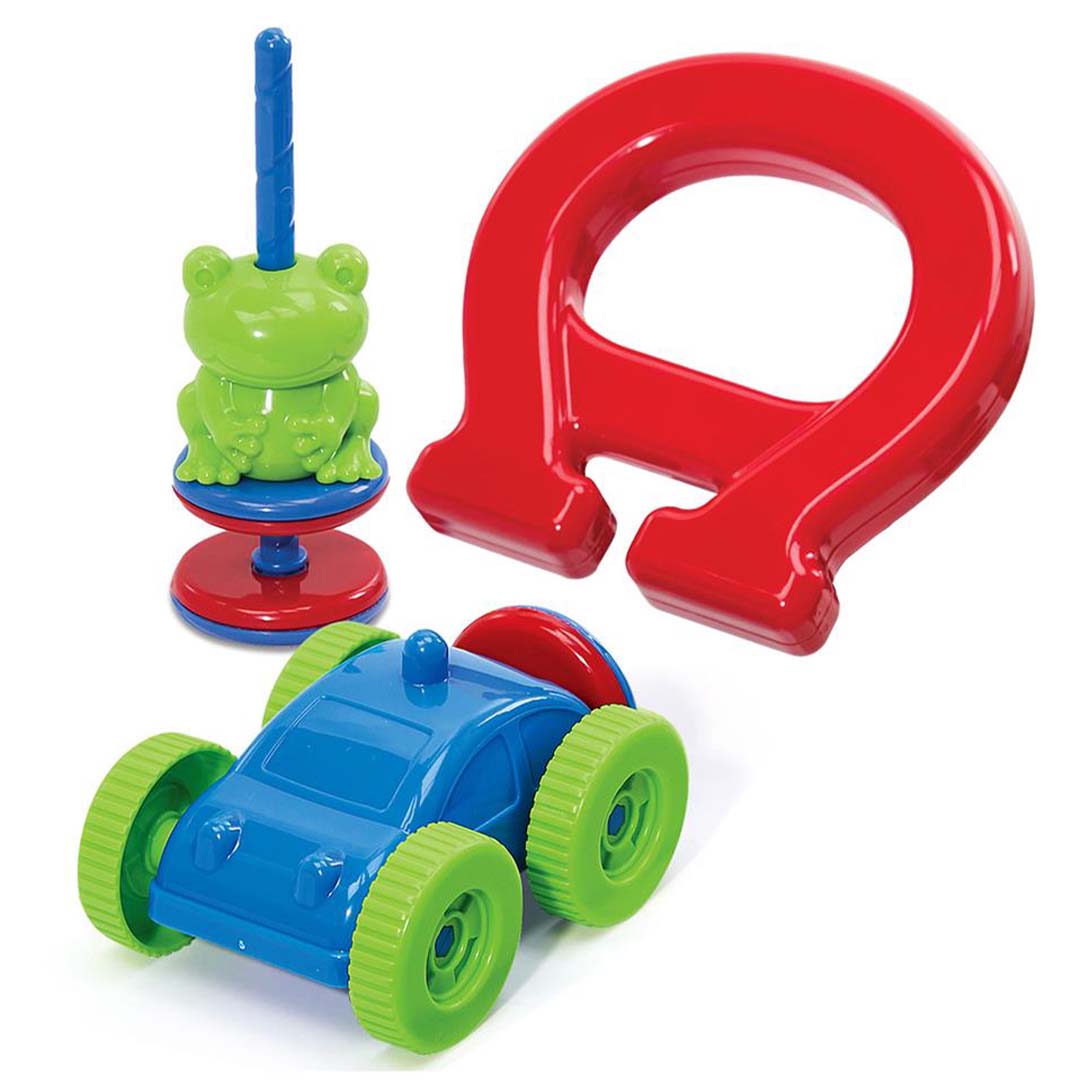 De losse onderdelen van de 4M magnetische wetenschapsset, waaronder een rode U-magneet, een blauwe auto en een groene kikkerfiguur.