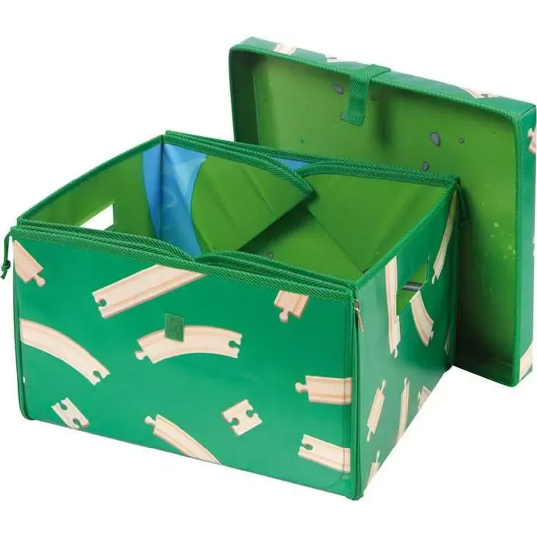 Groene opbergdoos met treinbaanpatroon en open deksel.