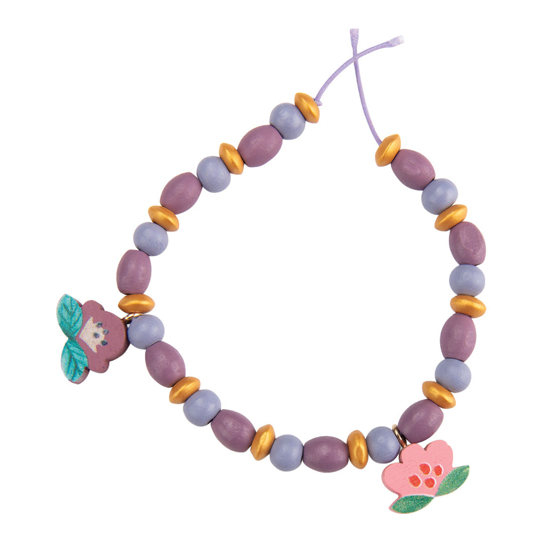 Houten kralenketting met paarse en gouden kralen en twee roze bloem bedeltjes.