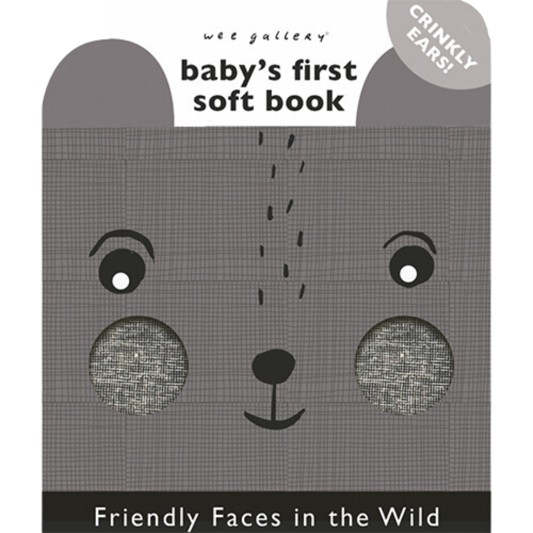 Wee Gallery babyspeelgoed stoffen boekje met een grijze berenkop en de tekst 'baby's first soft book'.