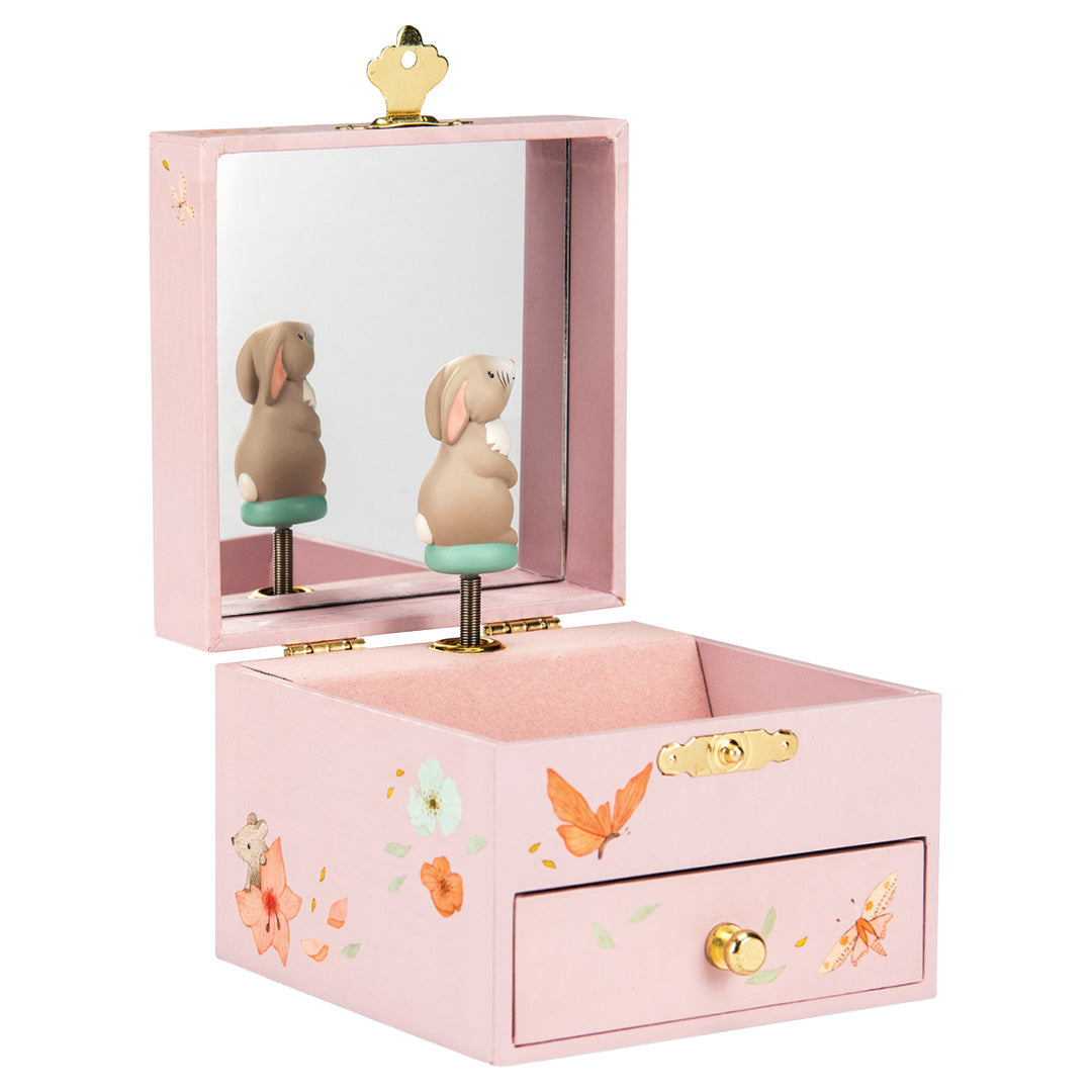 Moulin Roty roze muzieksieradendoos open met spiegel en dansend konijn, versierd met bloemen en vlinders.