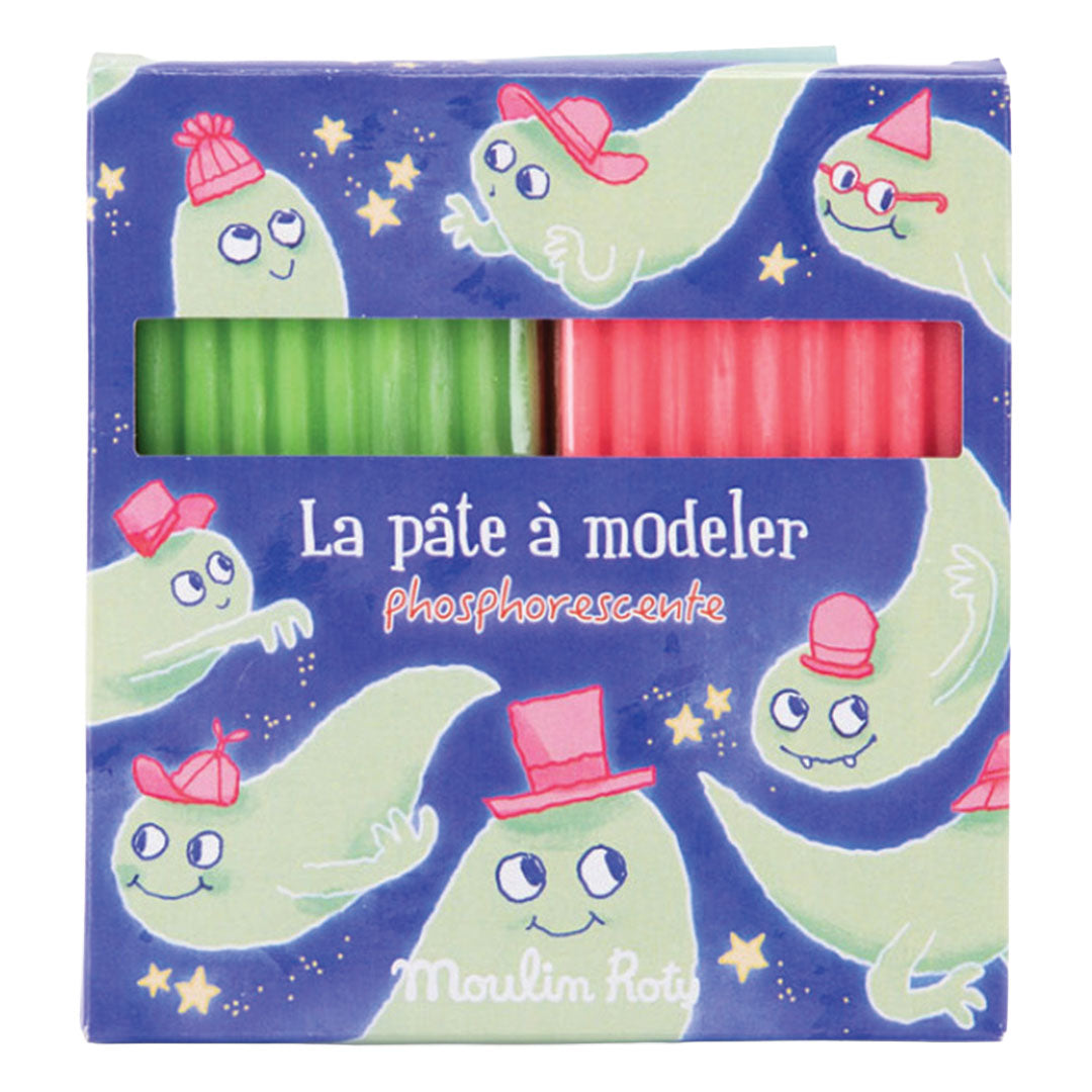 Moulin Roty verpakking van glow-in-the-dark boetseerklei met speelse figuren en sterren.