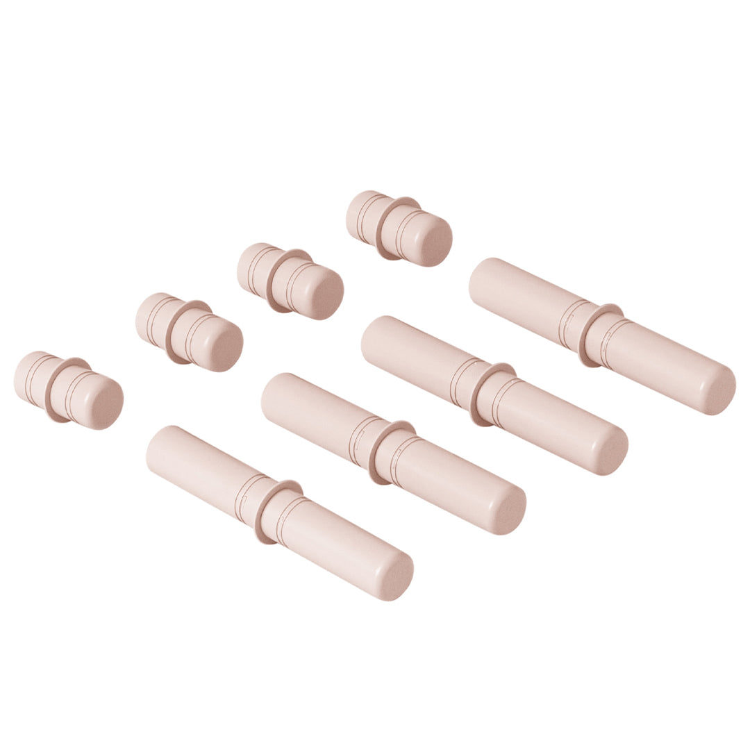 Modu plastic roze verbindingspinnen voor bouwspeelgoed, liggend op een witte ondergrond.