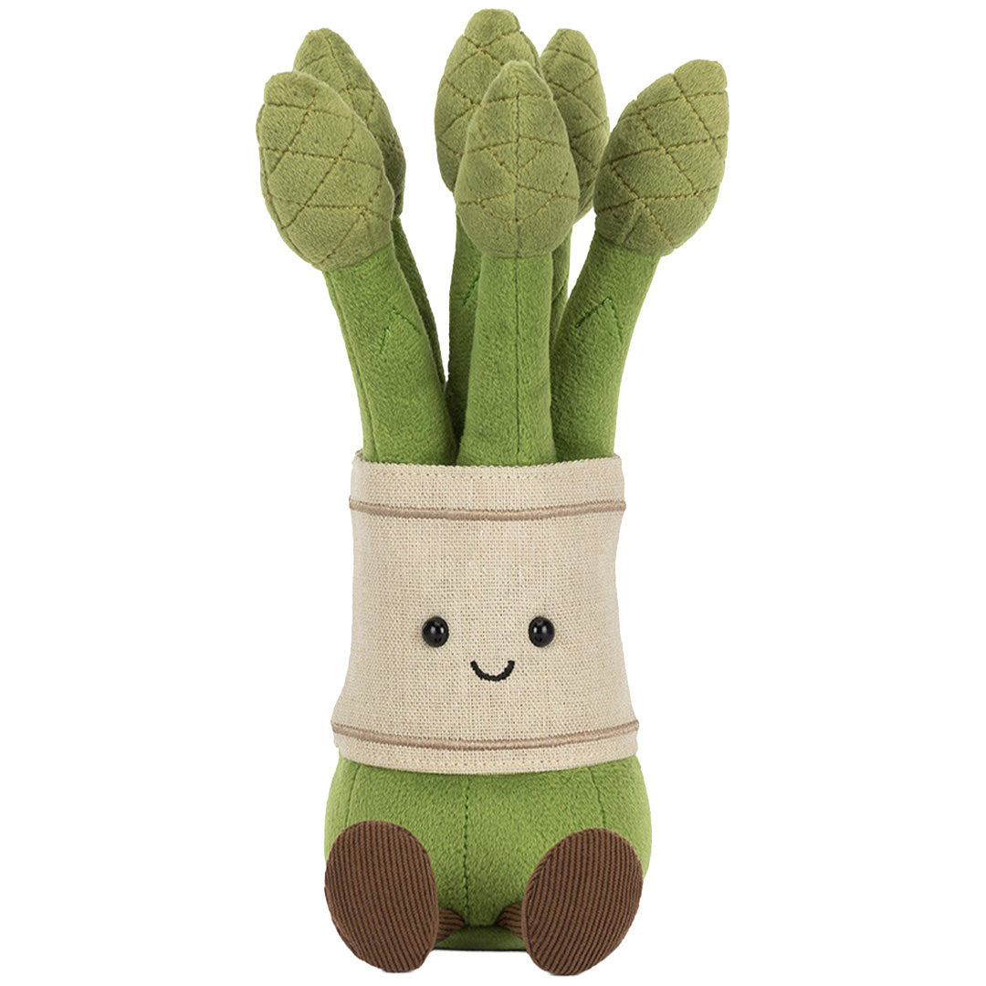 Jellycat knuffelplant asparagus met lachend gezicht en bruine voeten, recht van voren.