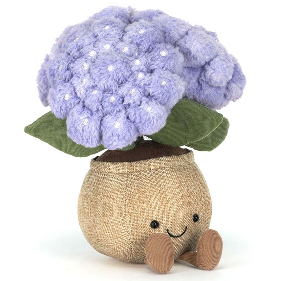 Jellycat knuffelplant Hydrangea met paarse bloemen en een lachend gezichtje, zittend.