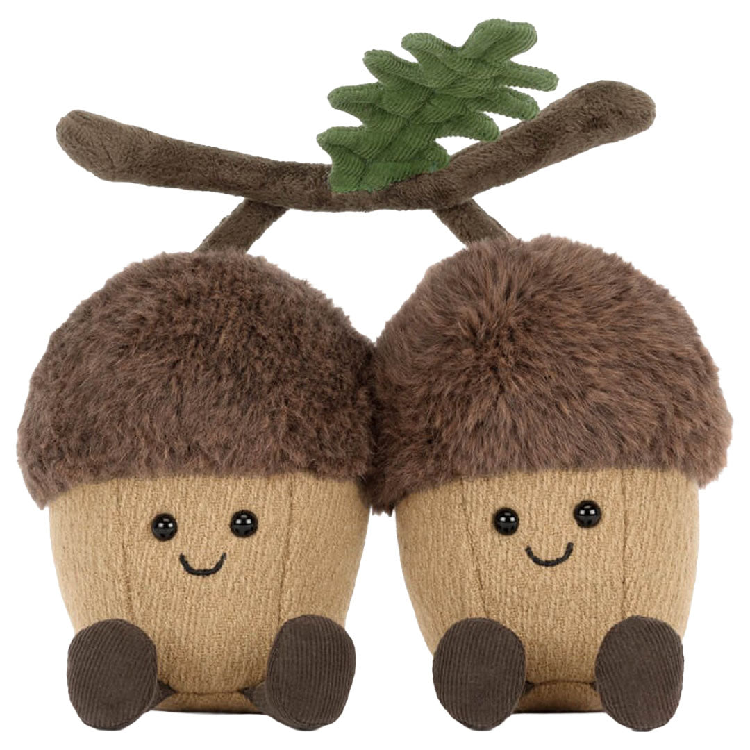 Jellycat pluchen speelgoed van twee lachende eikelnoten met een groene bladsteel, van voren gezien.