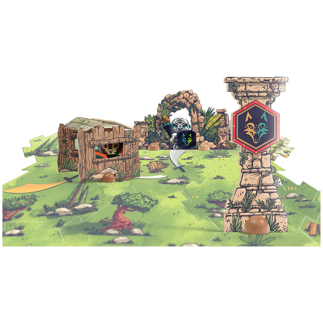 De Djeco Arty Toys vloerpuzzel met opgebouwde speelstukken zoals een hut en een stenen boog.