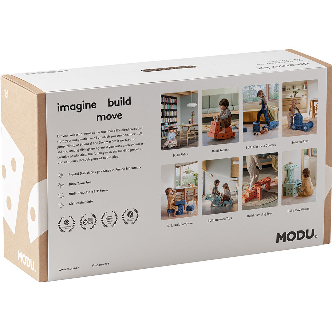 De achterkant van de Modu Dreamer Kit verpakking met voorbeelden van bouwcreaties en productinformatie.