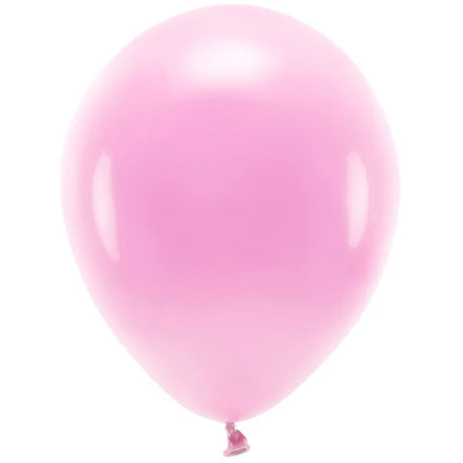 Een opgeblazen Partydeco ronde pastel roze ballon.