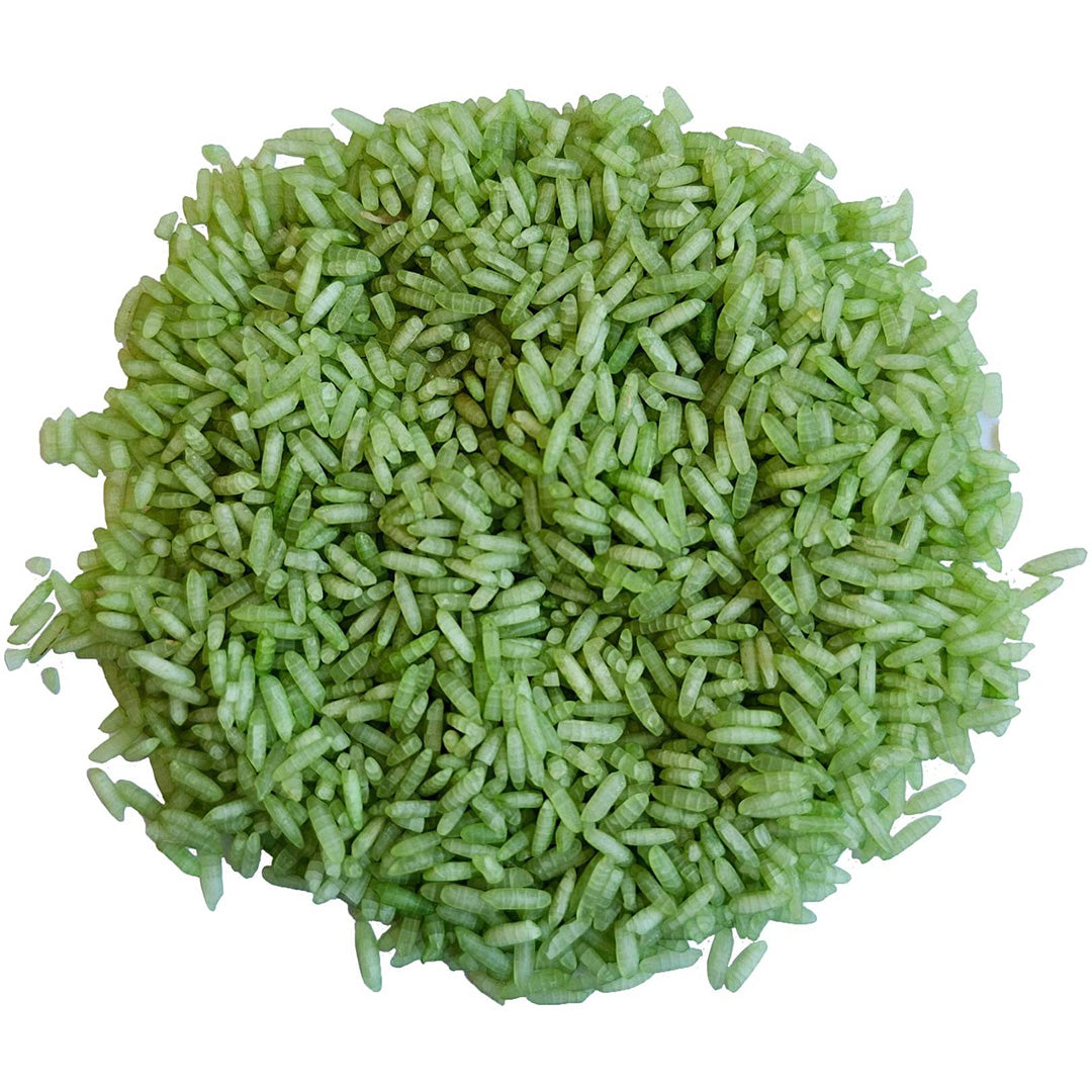 Een bovenaanzicht van een hoopje lichtgroene grennn speelrijst.