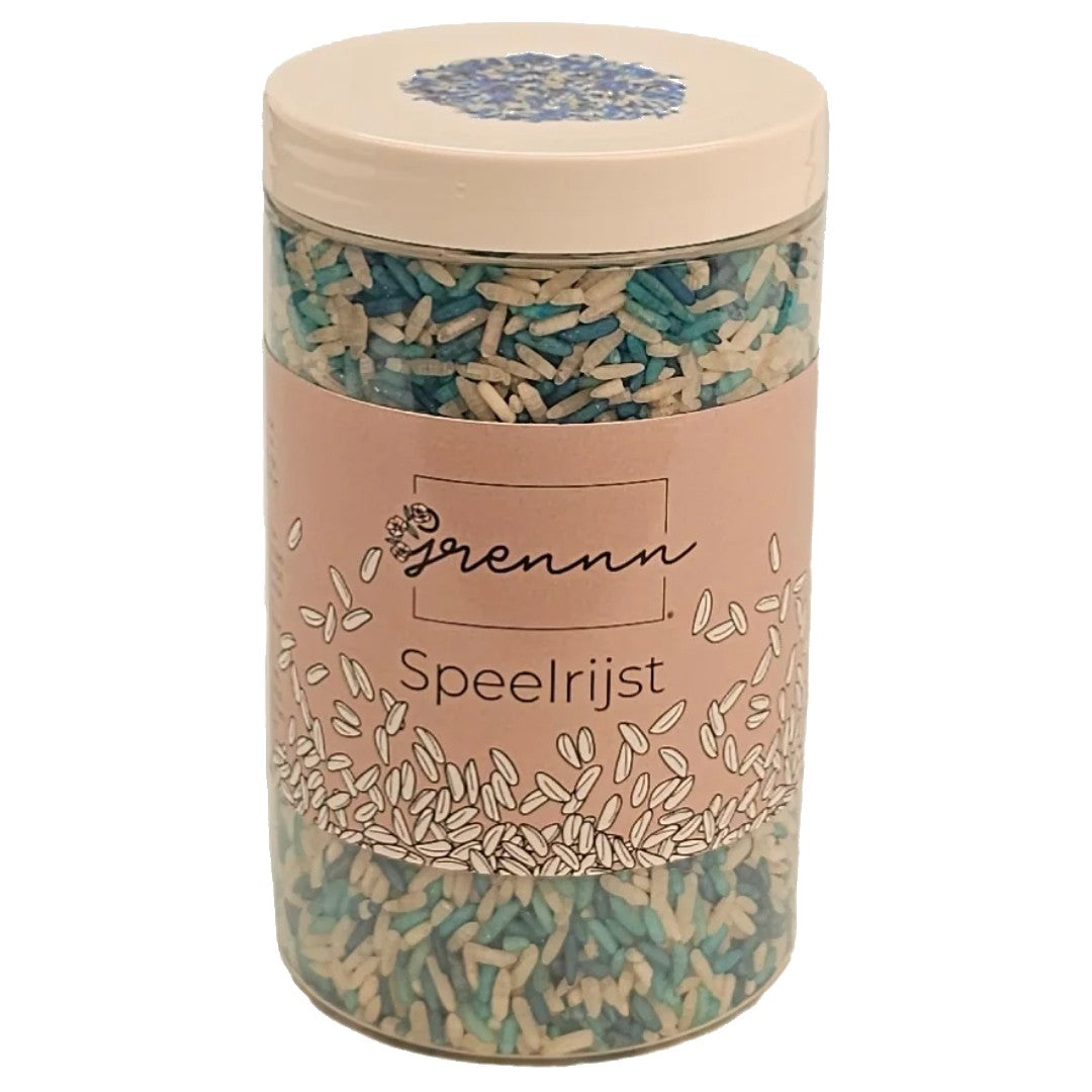 Verpakking van Grennn speelrijst ocean mix in een transparante pot met label.