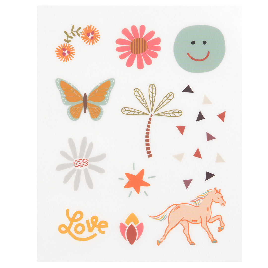 Detail van Lässig rub on stickers met bloemen, een vlinder, een palmboom en een paard.