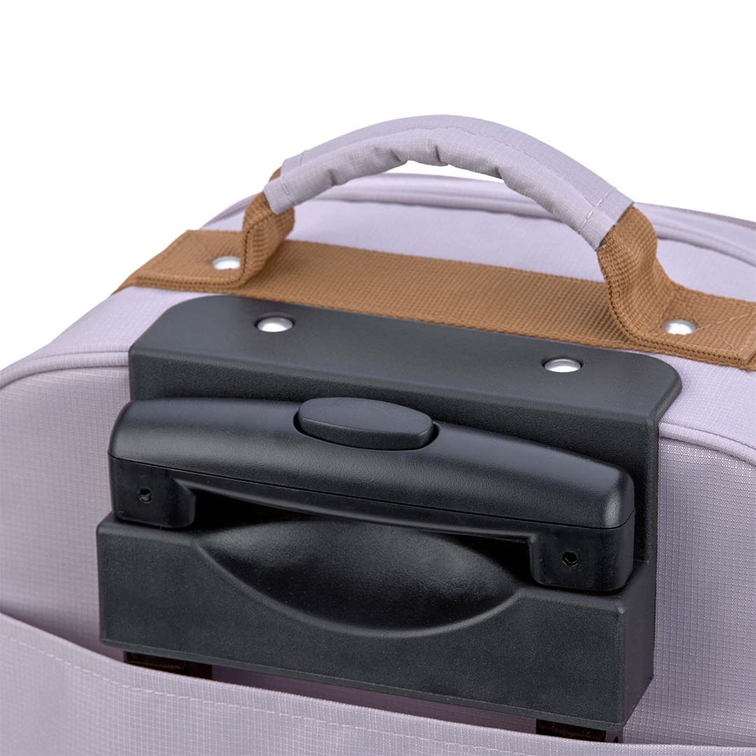 Detail van het uitschuifbare handvat van de lässig kinderkoffer in lila.