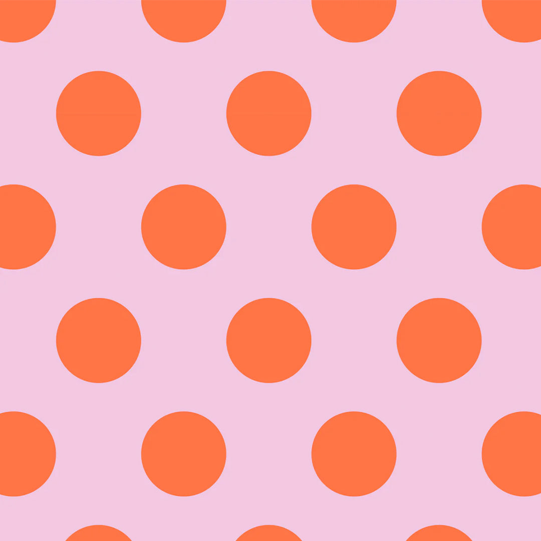 ole inpakpapier met een roze achtergrond en een patroon van oranje stippen.