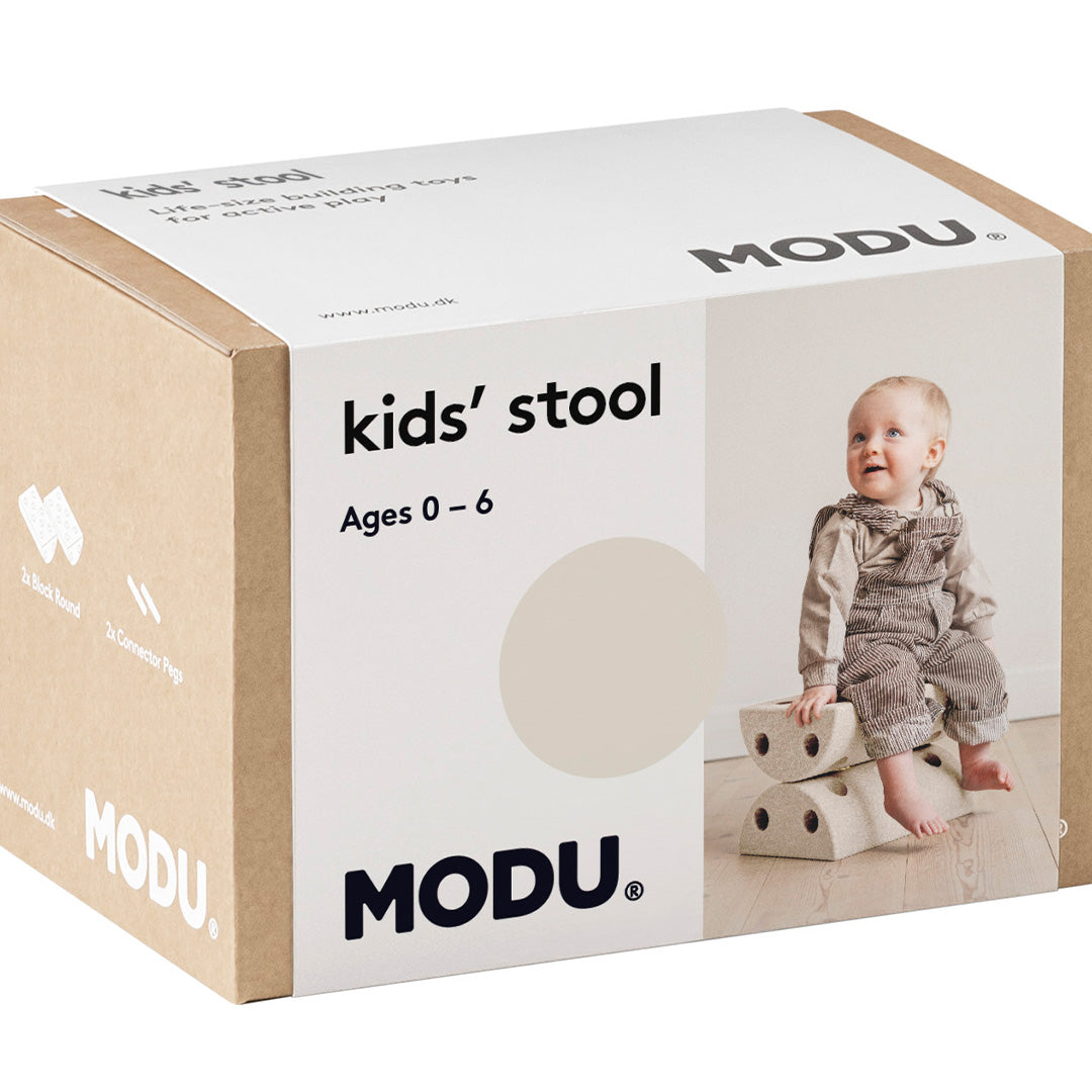 De verpakking van de modu kinderkruk in de kleur sand grey.