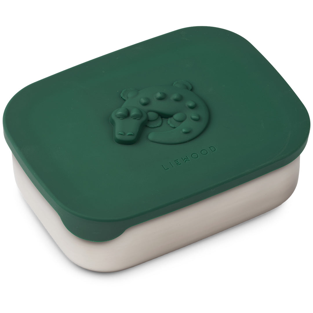 Liewood broodtrommel met groene deksel en krokodillenpatroon.