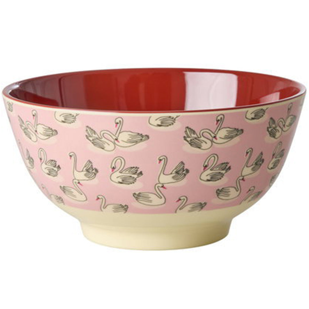 Rice kinderkom van melamine met roze buitenkant met zwanenpatroon en rode binnenkant.
