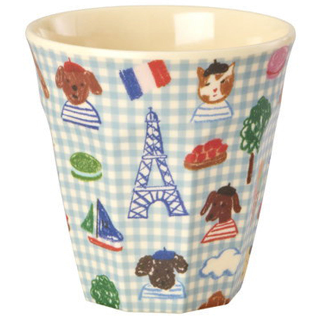 rice kinderbeker met blauw geruit patroon en Parijse illustraties van dieren en bezienswaardigheden.