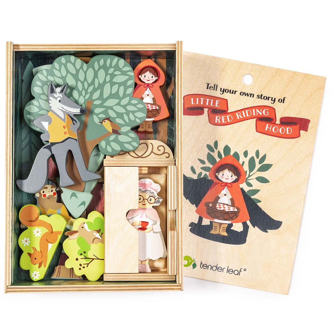De Tender Leaf Toys Roodkapje speelset verpakt in een houten doos met een informatiekaartje.