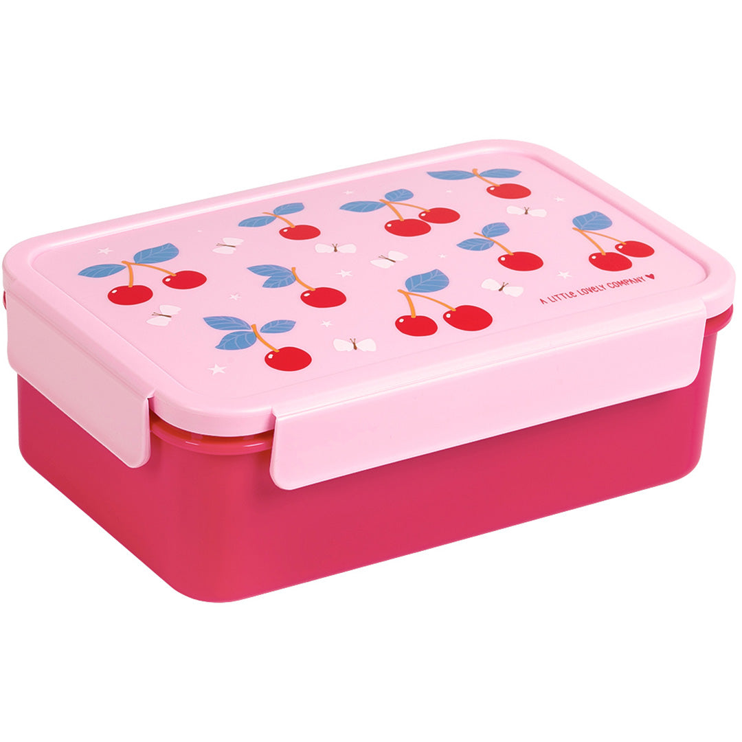 Een roze a little lovely company bento broodtrommel met kersenpatroon op de deksel.