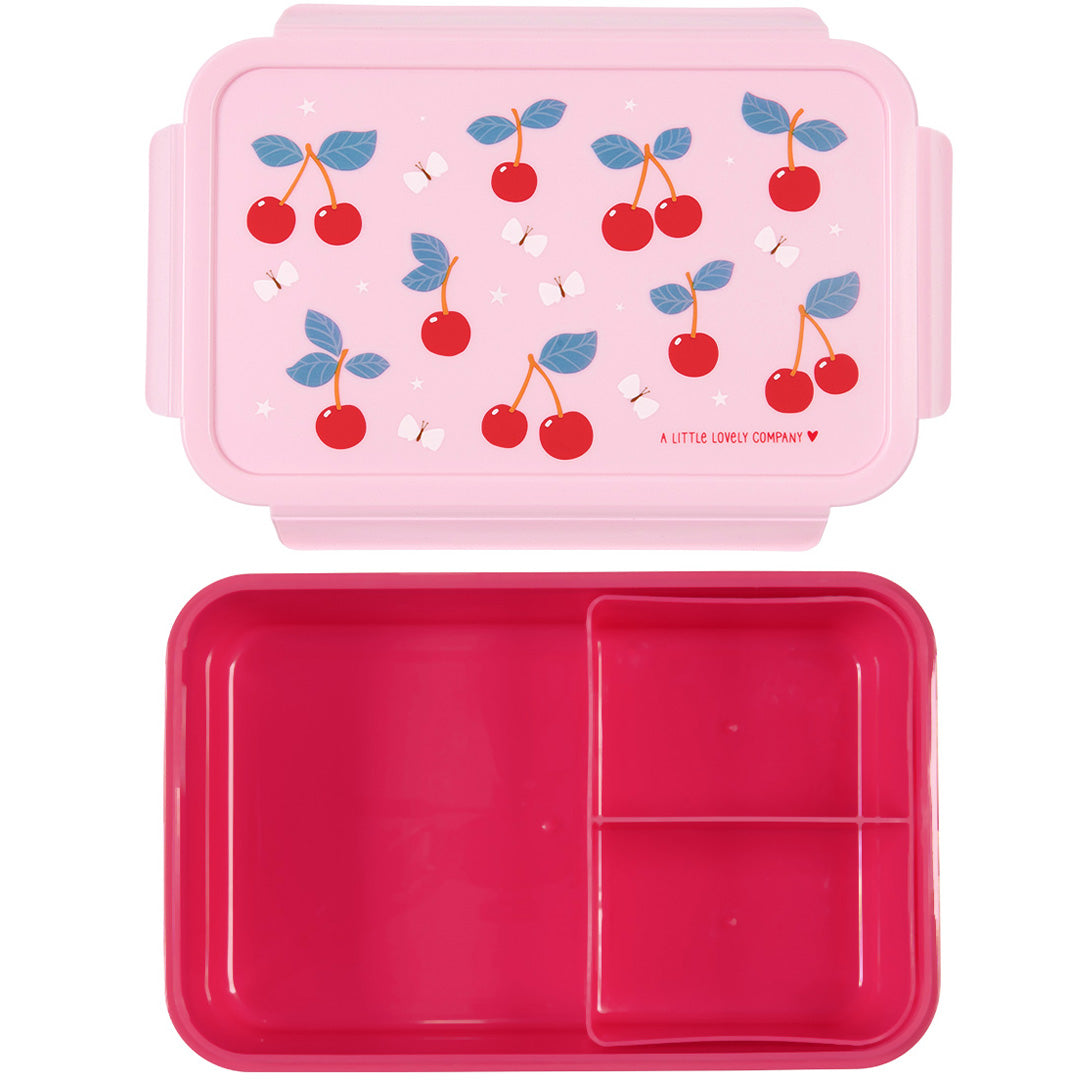 Een open roze a little lovely company bento broodtrommel met kersenpatroon op de deksel en vakjes in de onderkant.