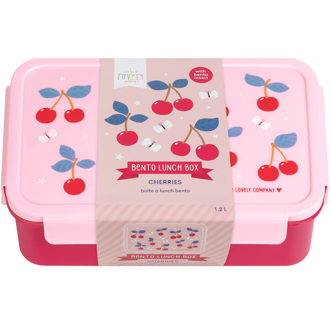 De verpakking van een roze a little lovely company bento broodtrommel met kersenpatroon.