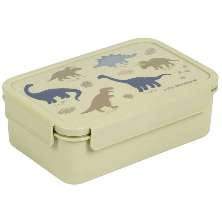 A Little Lovely Company beige broodtrommel voor kinderen met dinosaurusillustraties op de deksel, schuin van bovenaf gezien.
