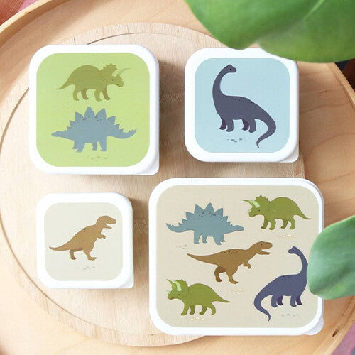 A little lovely company broodtrommelset met vier vierkante lunchboxen met verschillende dinosaurusafbeeldingen op de deksels.