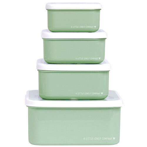 A little lovely company broodtrommelset met vier gestapelde groene lunchboxen met witte deksels, van voren gezien.