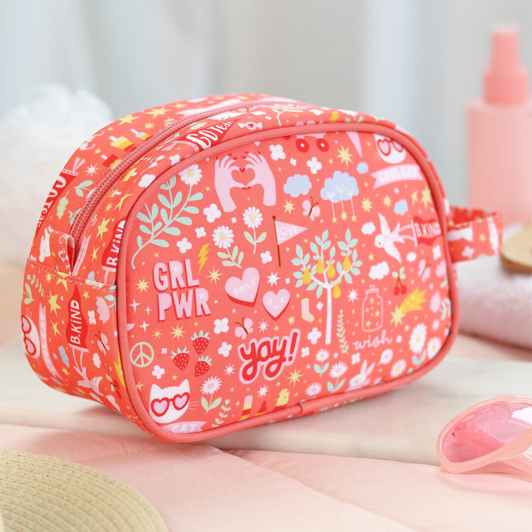 Zijaanzicht van de a little lovely company toilettas met 'fun' thema en diverse patronen.