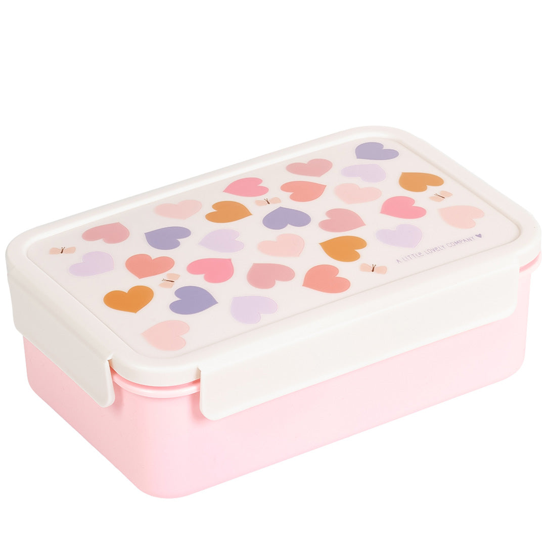 Een roze a little lovely company bento broodtrommel voor kinderen met een deksel versierd met kleurrijke hartjes.