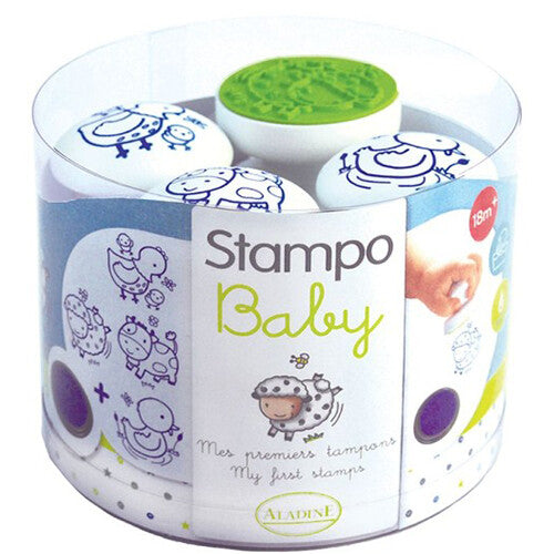 Aladine Stampo Baby boerderij stempels set in de transparante verpakking met vier stempels en een groene inktpad.